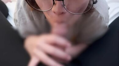 girl with glasses who does testicle licking and cock sucking