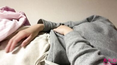 Masturbating in pajamas on the bed