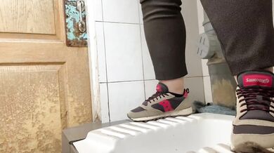 Mature milf pees in a hospital public toilet
