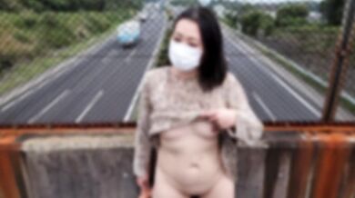 Bold masturbation on a high-speed overpass