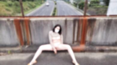 Bold masturbation on a high-speed overpass