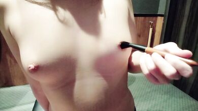 I stroke my nipples with a brush and cum