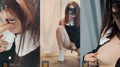Japanese schoolgirl with a tail in her ass, masturbates and pulls her nipples in the fitting room
