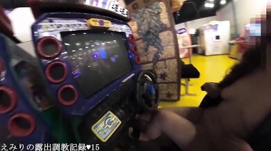 Emiri exposed at a penny arcade.