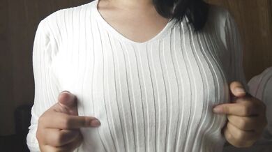 A Japanese woman with big breasts wearing a sweater given to her by a viewer and doing nipple mastur
