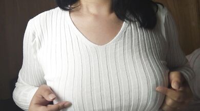 A Japanese woman with big breasts wearing a sweater given to her by a viewer and doing nipple mastur