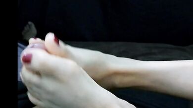 Delicious Footjob from milf with red nails