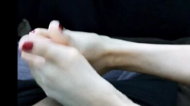 Delicious Footjob from milf with red nails