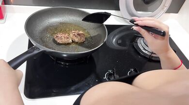 I found a Beautiful Milf Cooking in a Very Sexy dress with her Huge boobs