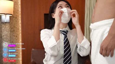 Japanese cosplayer gives a guy a handjob and cheekjob.