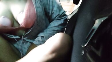 Naughty Japanese woman masturbates with toy in the car