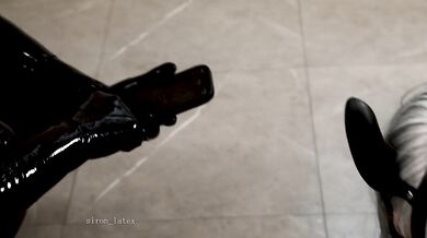 Rubber puppy is connected to a thick leash for a friendly walk