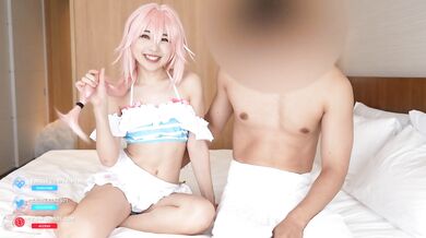 Japanese cosplayer gives a guy footjob and handjob.