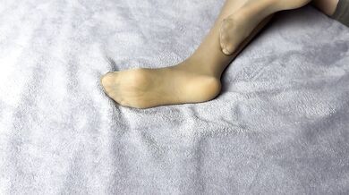 Secretary in nylon pantyhose loves her long legs