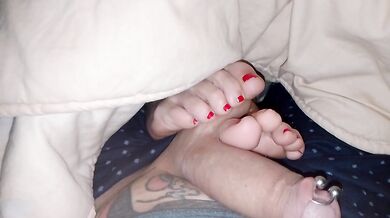 Homemade amateur footjob by a verified couple with finger massage