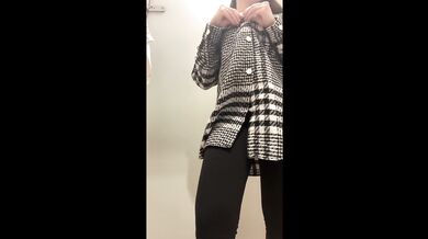 Dressing off and masturbating in crowdy clothes store!