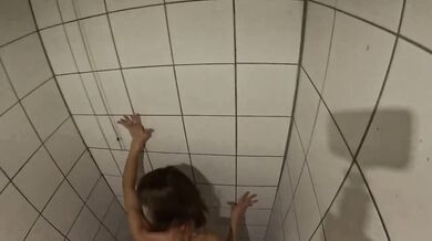 MILF in the public restrooms of a rest area is looking for a daddy to cum in her hot pussy