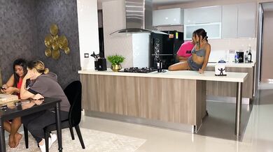 Aisha Fucks her friend in the kitchen while her family is at the table