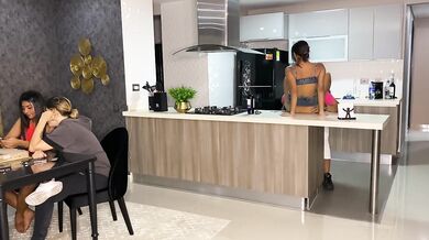 Aisha Fucks her friend in the kitchen while her family is at the table