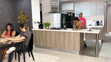 Aisha Fucks her friend in the kitchen while her family is at the table