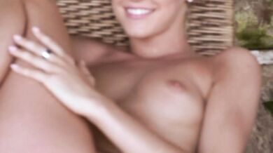 Faith Relaxes In A Chair And Fingers Herself Until She Cums