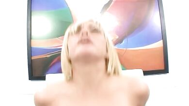 Impressive A blonde engages in a provocative sexual act on a large genitalia while wearing just cowb