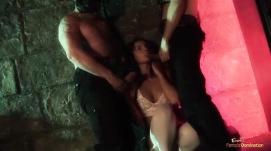Two demons break from their cages and fuck a brunette in white stockings