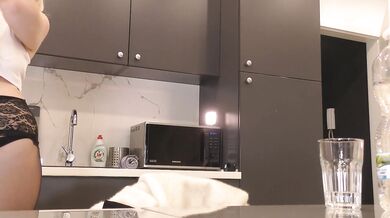 Hot and sexy tight pussy blonde wife in the kitchen shows her sheer shiny black pantyhose and takes off panties