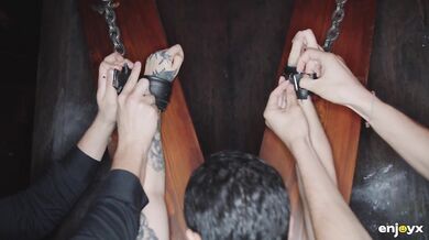 Obedient tattooed slut gets gagged and dominated by two rough guys in BDSM style