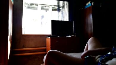 Milf fucks herself for window cleaner