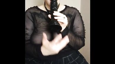 Chubby redhead plays with BBC toy