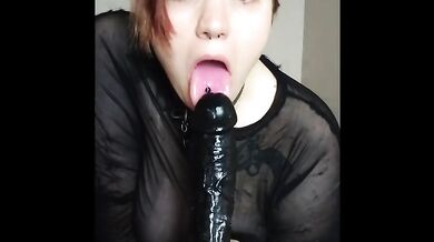 Chubby redhead plays with BBC toy