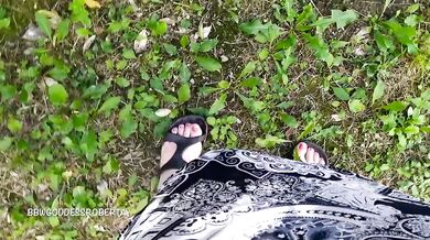I walk barefoot in the grass in public and show you my dirty soles