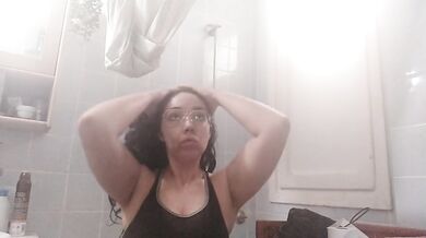 Shower of this big ass busty Spanish MILF can't help but masturbate