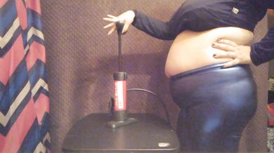 Massive Bike Pump Belly Inflation in Shiny Leggings