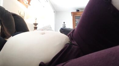 Chubby girl masturbates to her full belly