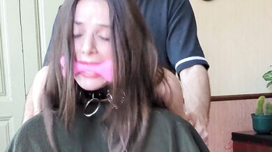 Sex slave handcuffed to a chair cums with a new toy