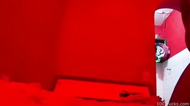 Interracial sex filmed in a dimly lit brothel