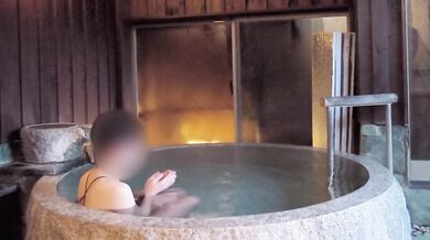 Endurance sex in an open-air bath while wearing a black see-through dress