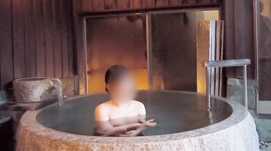 Endurance sex in an open-air bath while wearing a black see-through dress