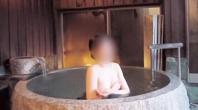 Endurance sex in an open-air bath while wearing a black see-through dress