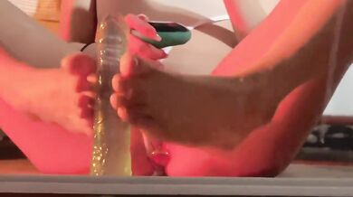Crystal silicone cock inserted into semi transparent high fork swimsuit