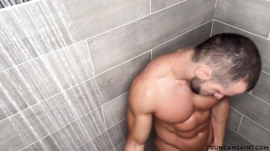 Horny voyeur caught him in the shower