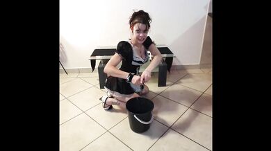 Pissing on french maid and she cleans it up