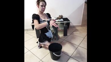 Pissing on french maid and she cleans it up