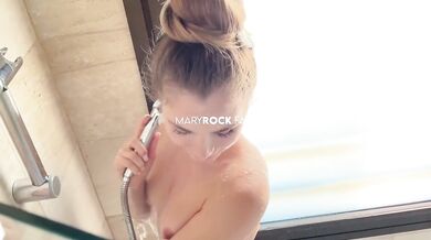 A hot girl went to the shower and got so excited there that she brought herself to orgasm