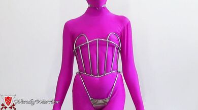 My Iron Maiden Corset is locked over a pink zentai