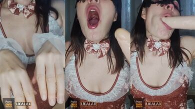 Lika Lax plays with strawberries in her mouth and fucks herself in the throat