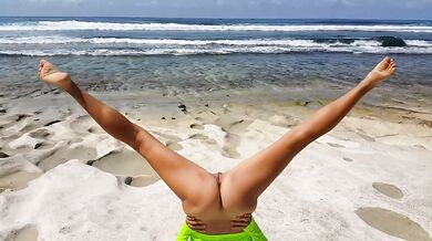 Naked YOGA # Morning Yoga exercises at Ocean Shore