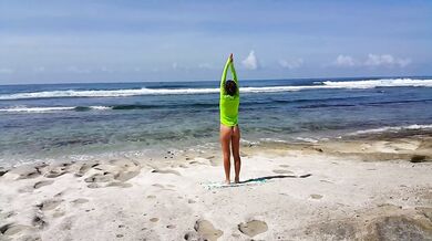 Naked YOGA # Morning Yoga exercises at Ocean Shore